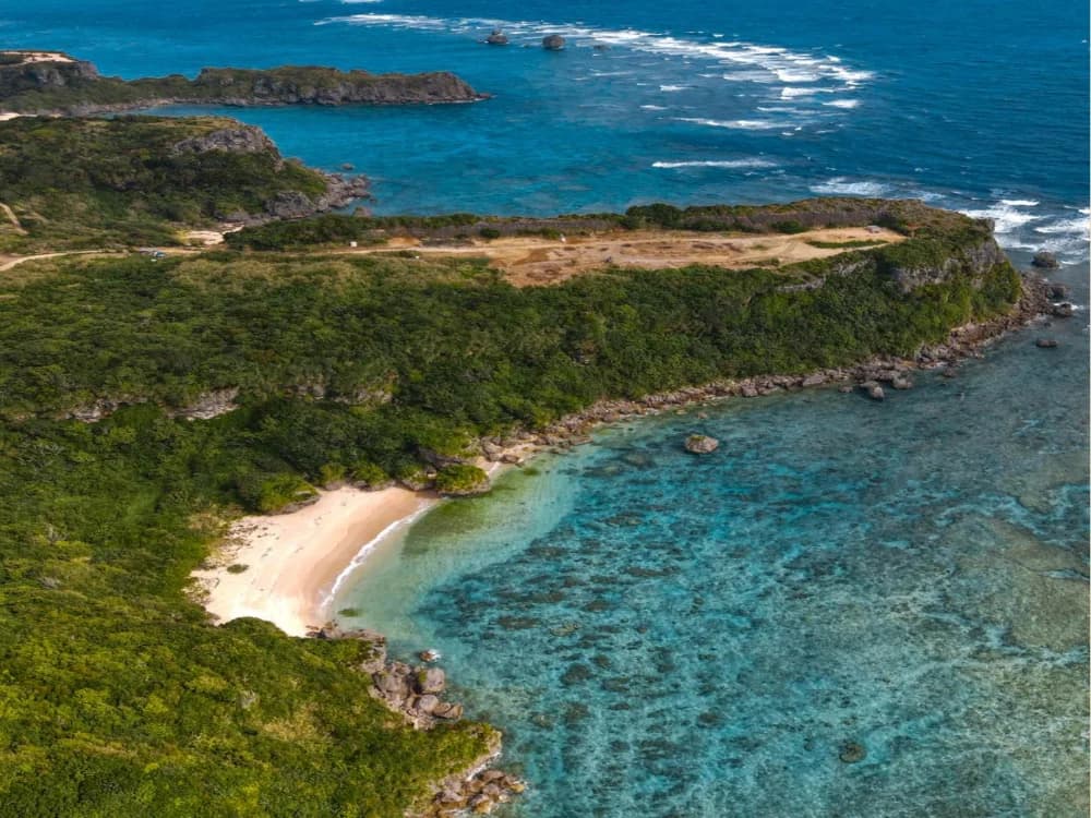 Aerial view of Yanbaru, northern Okinawa — UNESCO World Natural Heritage site where Kangen Ukon turmeric is grown